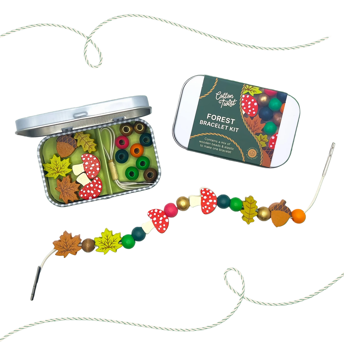 Forest-themed bracelet kit with open tin, bracelet, and packaging on a white background