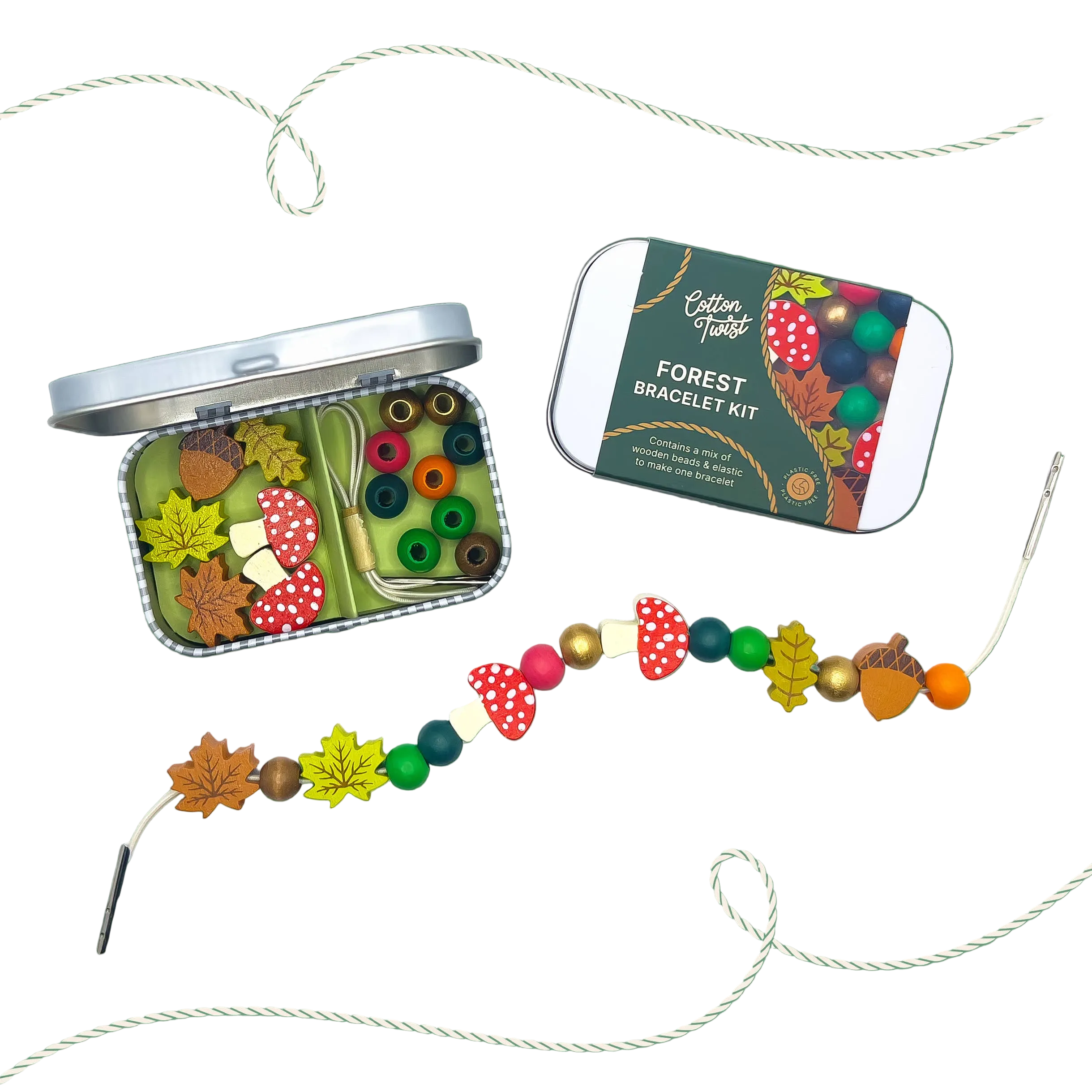 Forest-themed bracelet kit with open tin, bracelet, and packaging on a white background