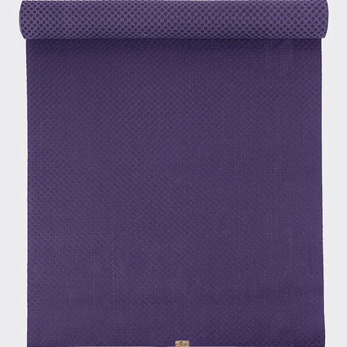 Purple textured yoga mat with brand logo on a white background