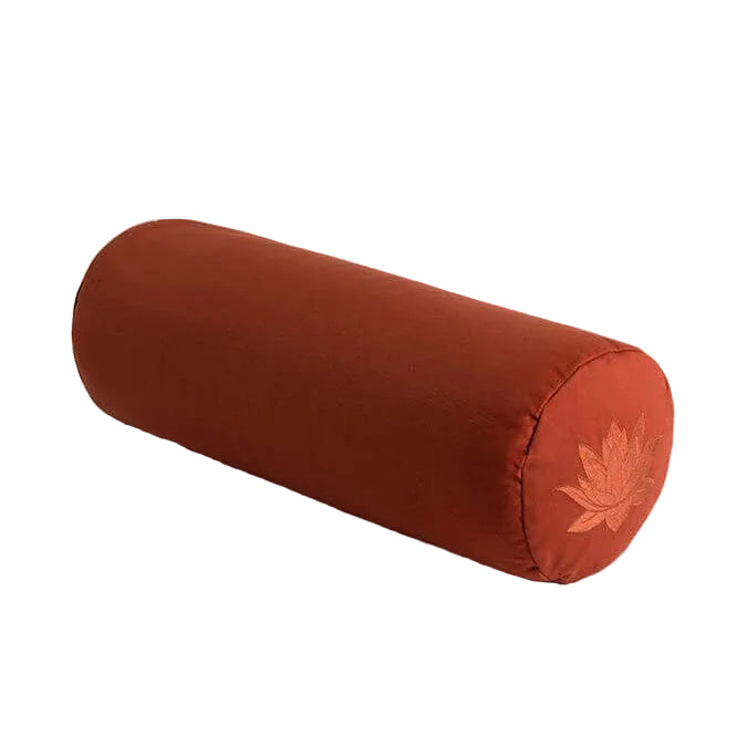 Brown cylindrical pillow with a lotus flower design on a white background