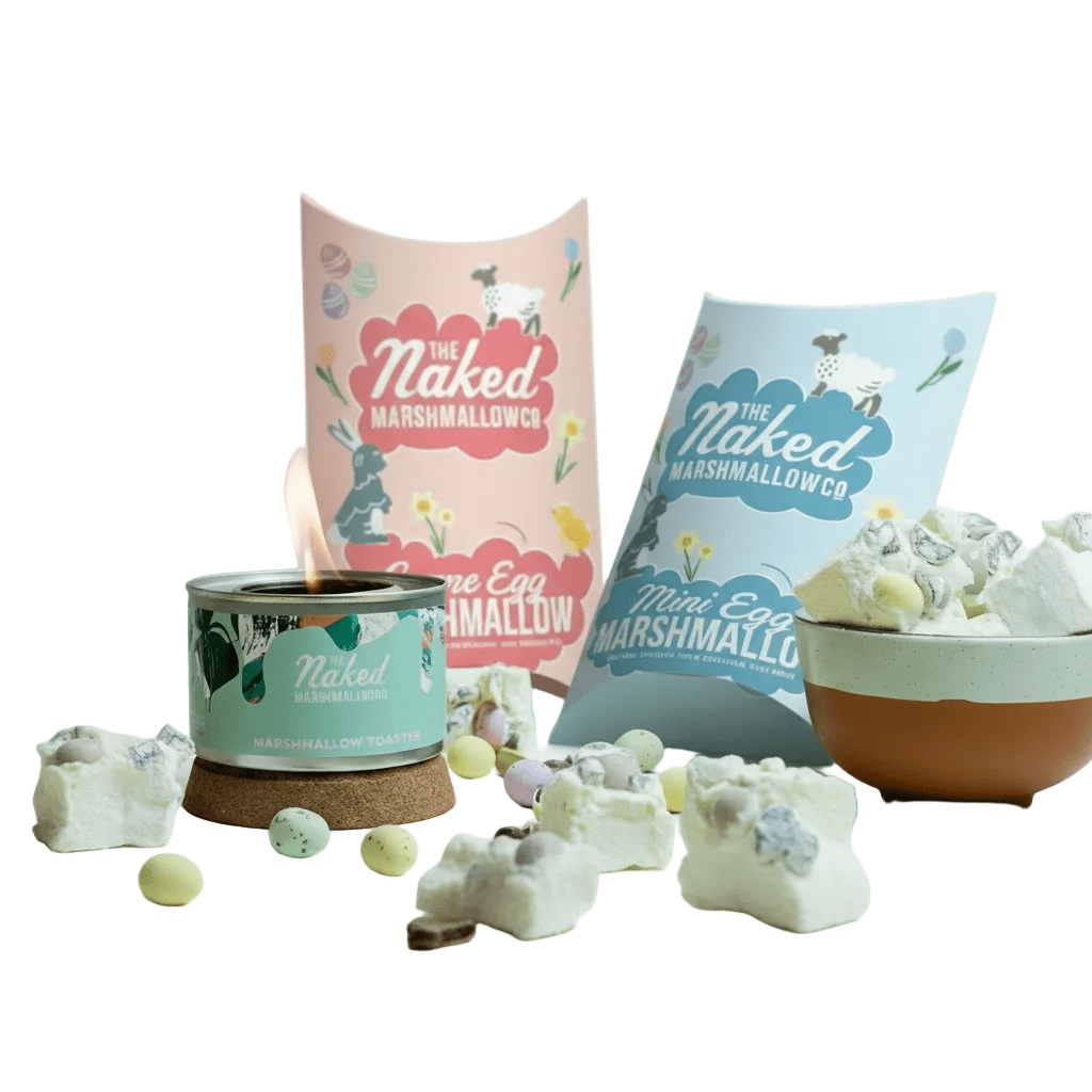 Naked Marshmallowco products including a candle, packaging, and marshmallows on a white background