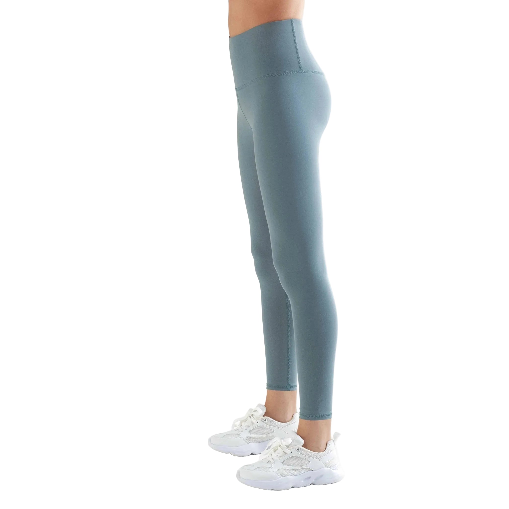 Light blue leggings worn by a person on a white background