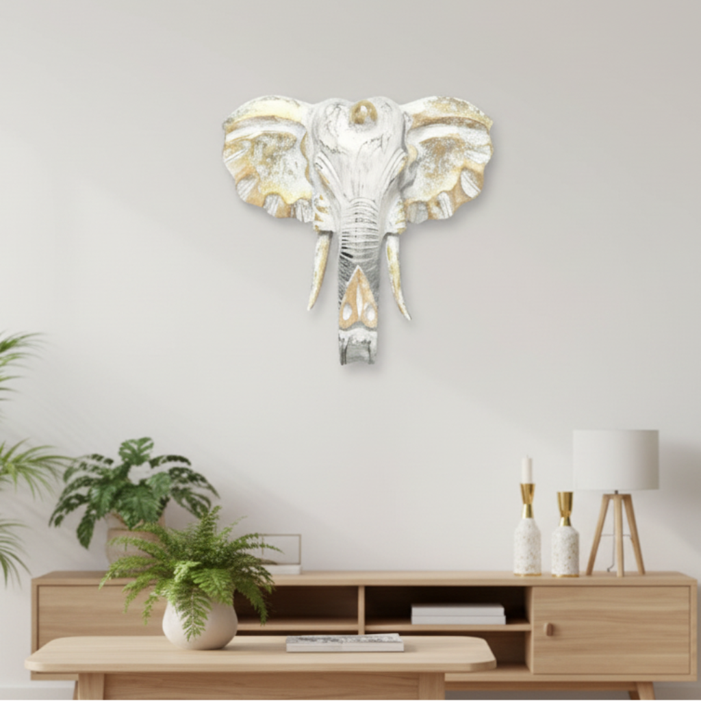 Living room with a decorative elephant wall art piece.