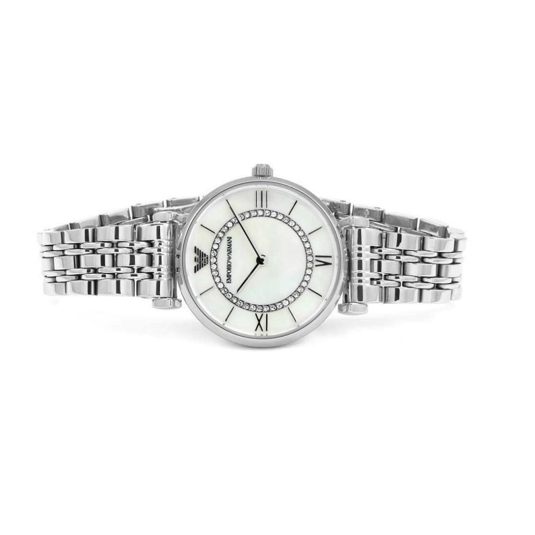 Silver watch with a white face on a white background