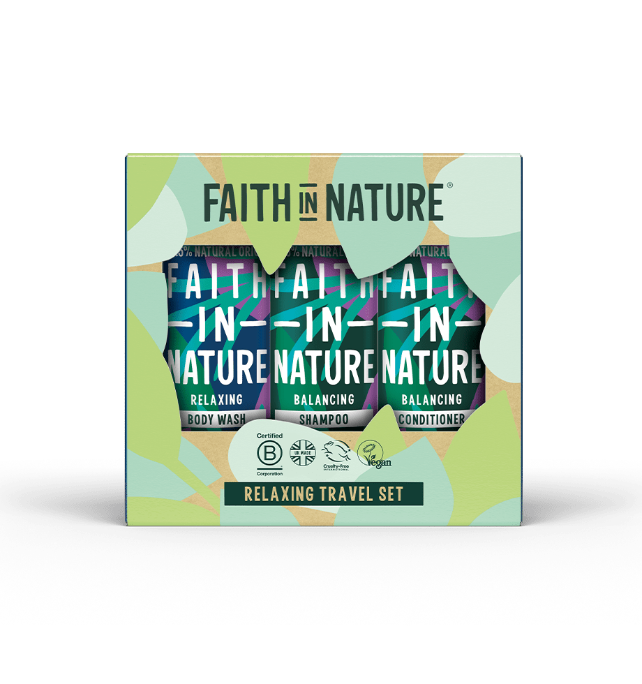 Faith in Nature Relaxing Travel Set packaging box featuring three travel masks (body wash, shampoo, conditioner) with a green, beige, and multicolor abstract background design.