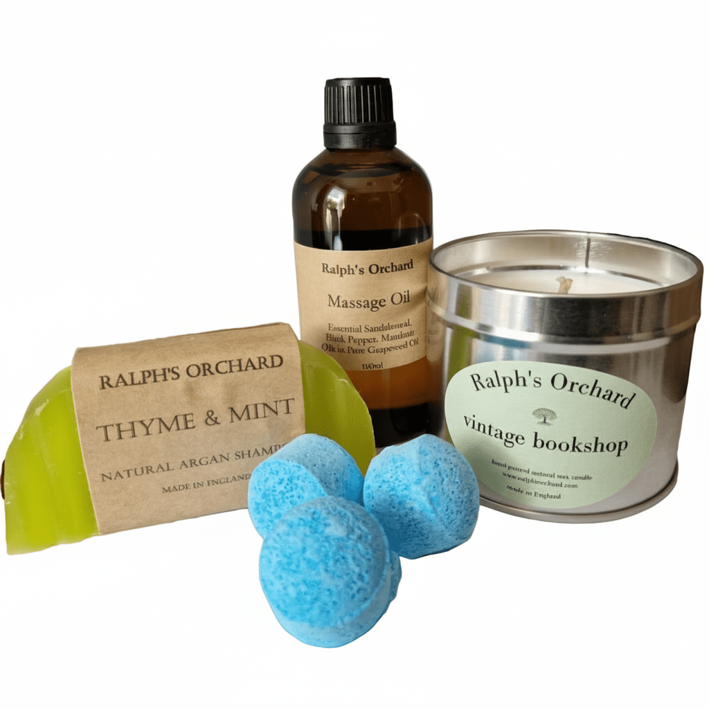 Collection of Ralph's Orchard products, including a candle, shampoo bar, bath bombs, and massage oil on a white background.