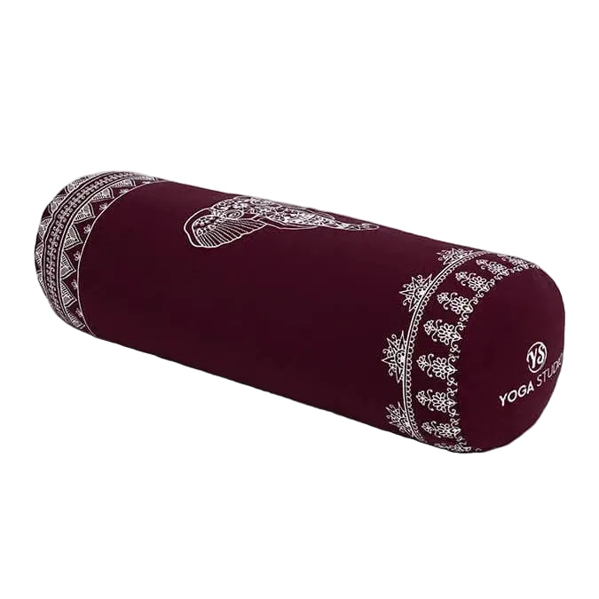 Maroon yoga bolster with white patterns on a white background