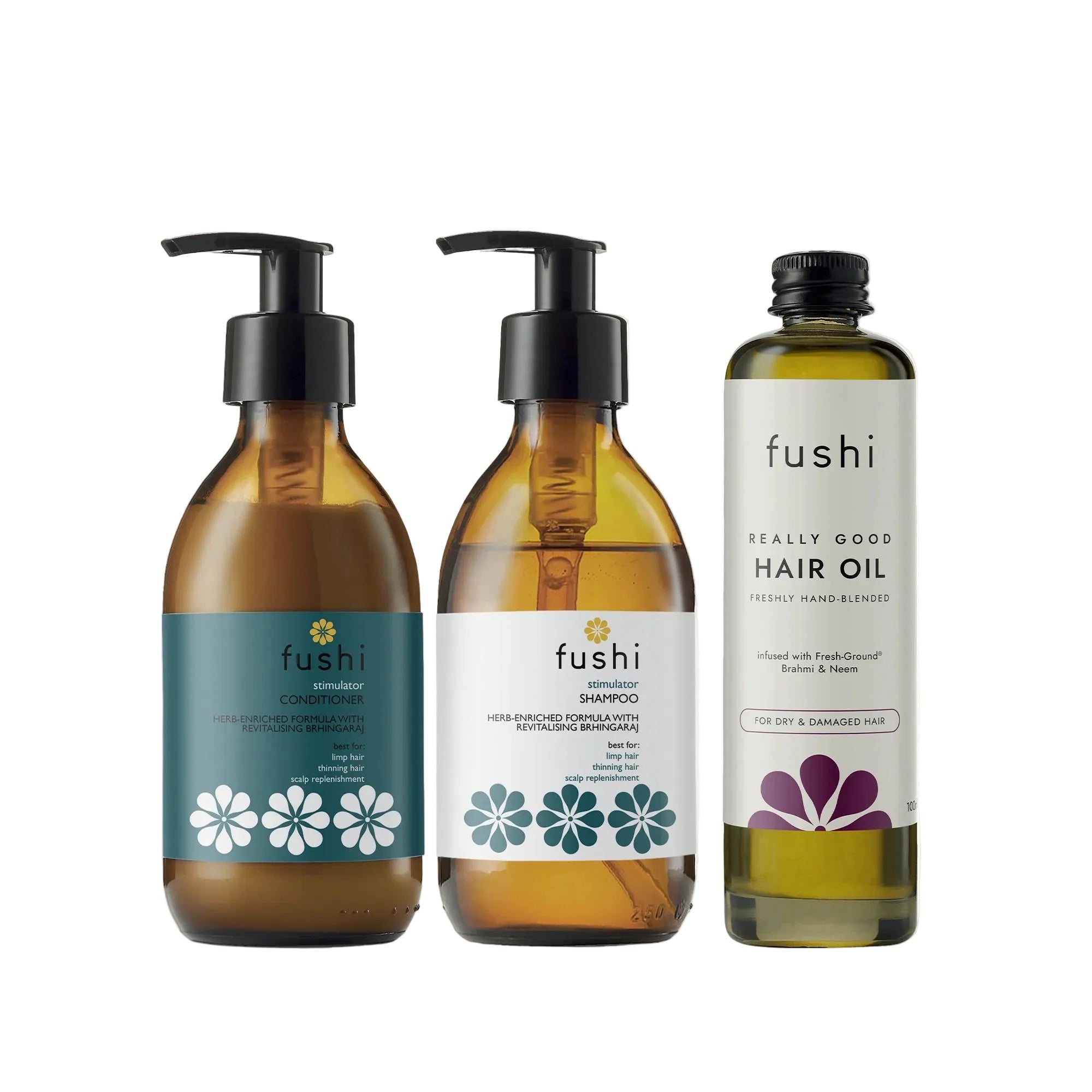 Fushi hair care products including shampoo and hair oil on a white background