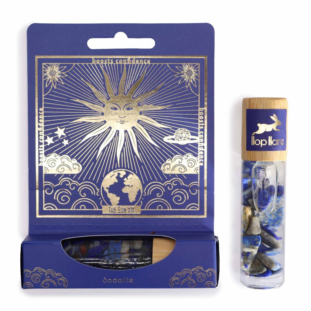 Emmy Jane - Essential Oil Gemstone Roll On - Hop Hare - Made in the UK. Each Hop Hare roll-on bottle features a specially selected essential oil blend, chosen for its aromatic properties that synergize with the gemstone power. This magical pairing creates a double force, boosting the holistic benefits of both elements.The extra layer of magic is a detachable gold-printed tarot card that unveils a world of storytelling.