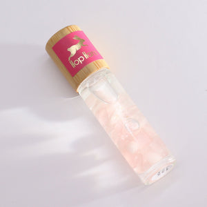 Emmy Jane - Essential Oil Gemstone Roll On - Hop Hare - Made in the UK. Each Hop Hare roll-on bottle features a specially selected essential oil blend, chosen for its aromatic properties that synergize with the gemstone power. This magical pairing creates a double force, boosting the holistic benefits of both elements.The extra layer of magic is a detachable gold-printed tarot card that unveils a world of storytelling.