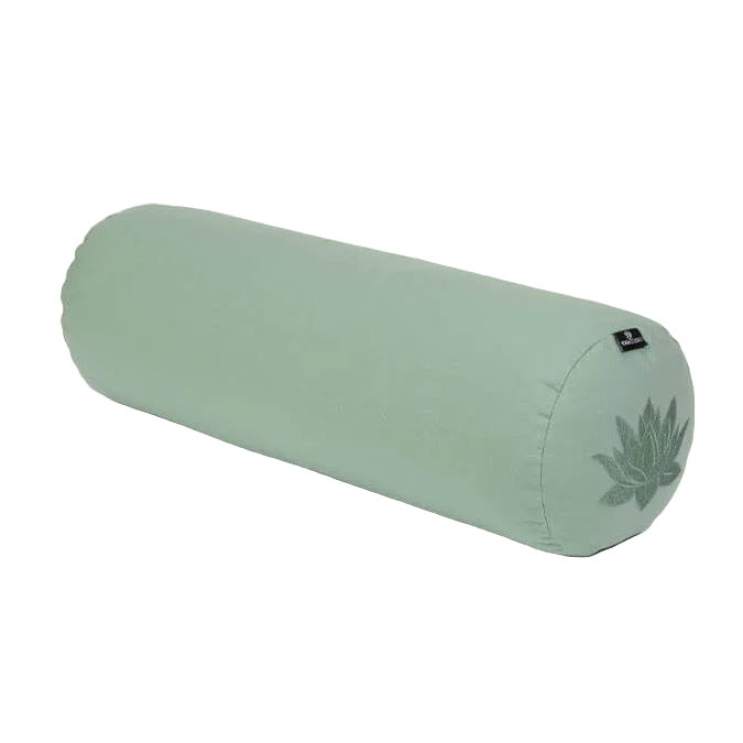 Green yoga bolster with a leaf design on a white background