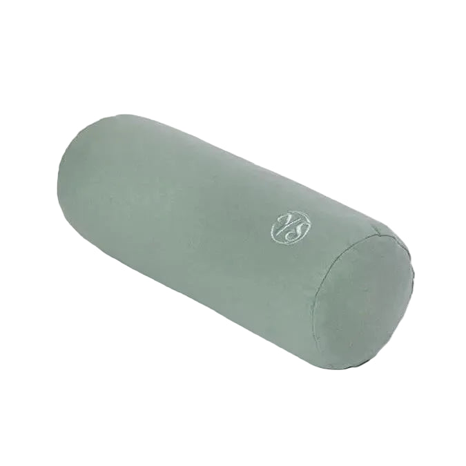 A sage green cylindrical yoga bolster pillow with a small white logo, shown on a plain white background.