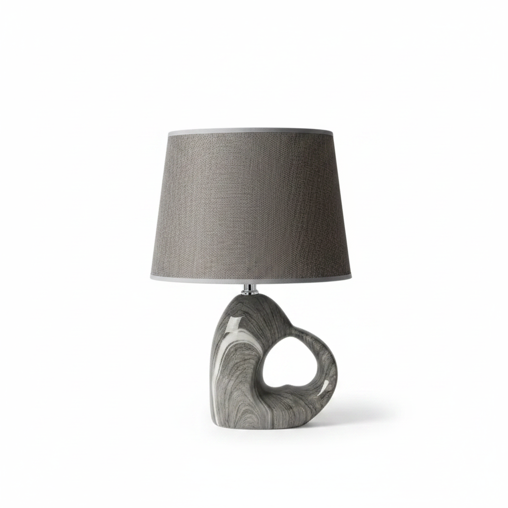 Modern Grey Marbled Ceramic Table Lamp with sculptural cut-through base and coolie shade on white background