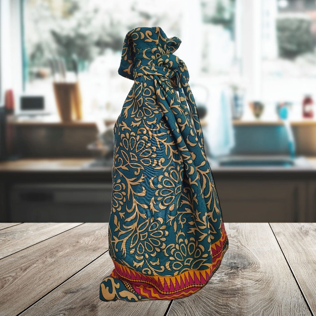 Decorative fabric with intricate patterns on a wooden surface