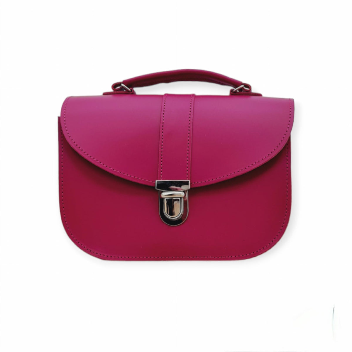 Zatchels Olympia magenta leather handbag with top handle, curved flap and silver-coloured push-lock on white