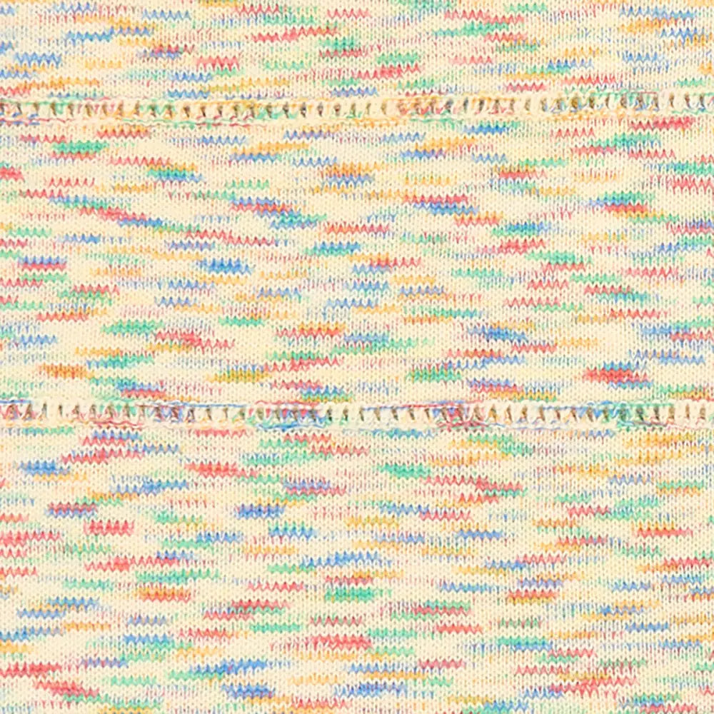 organic cotton knitted baby jumper fabric close up.