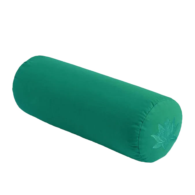 Green yoga bolster with a subtle design on a light beige background