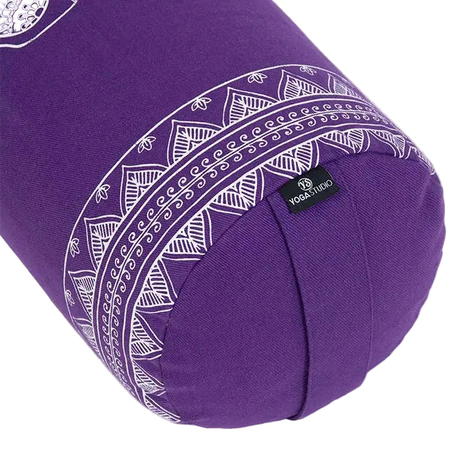 Purple yoga bolster with white patterns on a white background