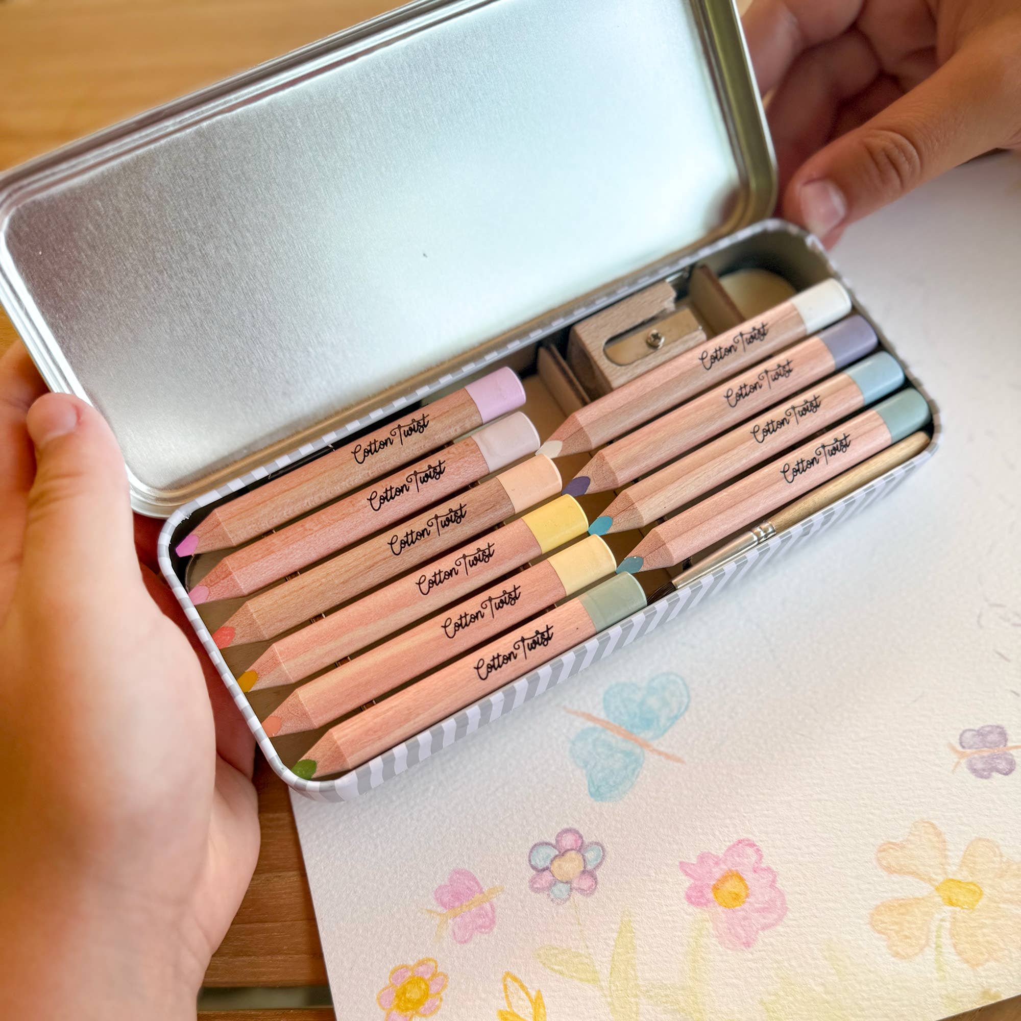 Set of eco-friendly watercolour pencils in a metal case