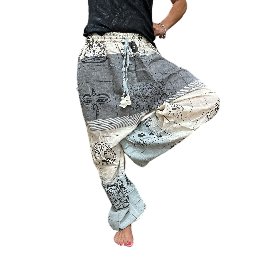Cotton Yoga Trousers Comfy Festival Pants - Colourful Himalayan prints.a full range of Yoga and Festival Pants for you, all made from 100% cotton. These pants are made in Nepal and are super soft, lightweight, and stylish. They come in one size that fits everyone, making them a great choice for most people. Plus, we deliver these yoga and festival pants in a small cotton bag to add a special touch. The collection features three styles: High Cross, Aladdin, and Fisherman