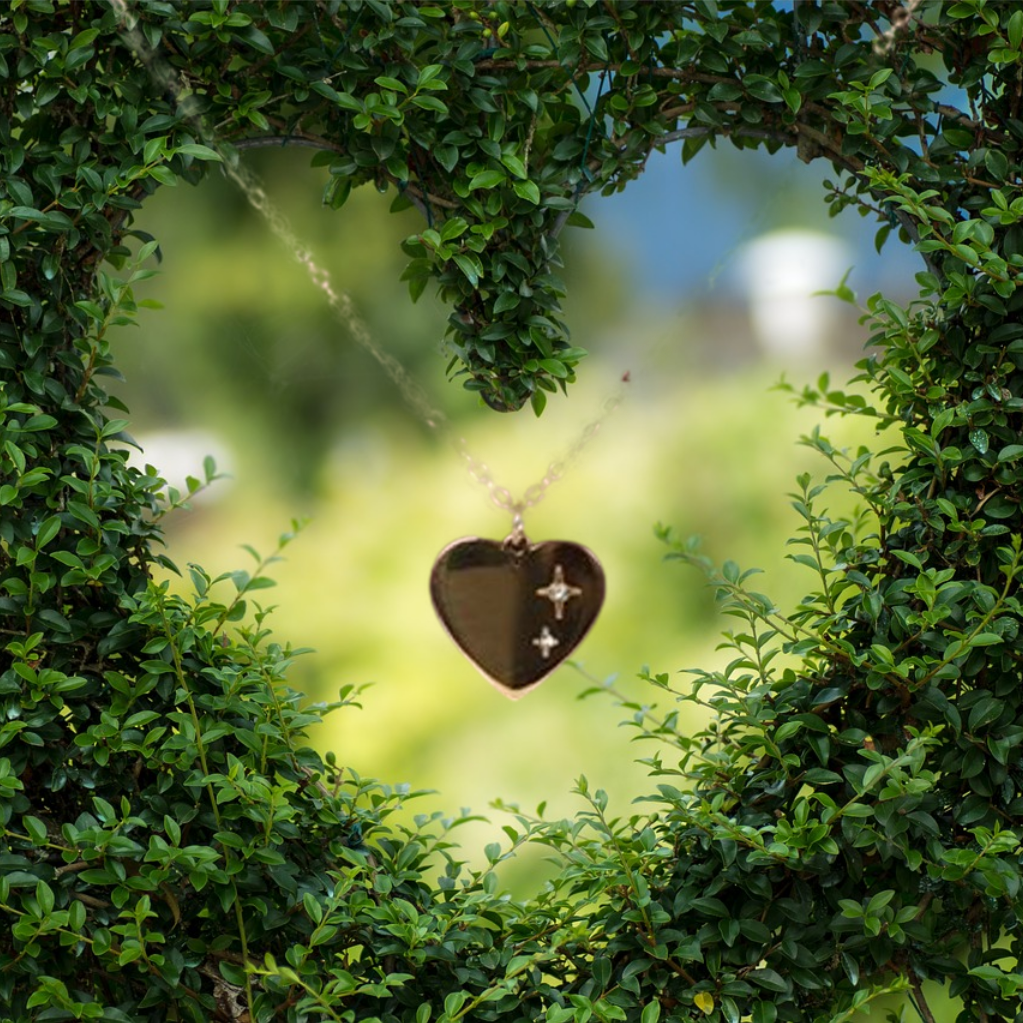 Valentines Necklace - The Lovers Tarot Necklace on Greeting Card. A mystical gold-tone heart necklace beautifully presented on a matching greeting card perfect for gifting. Inspired by the art of tarot reading.