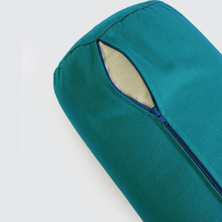 Teal fabric with a zipper on a white background