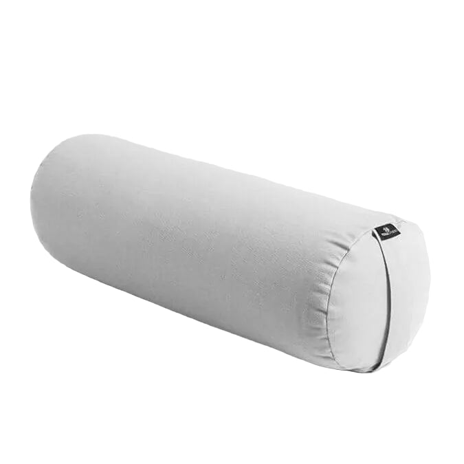 Grey cylindrical pillow on a light grey background