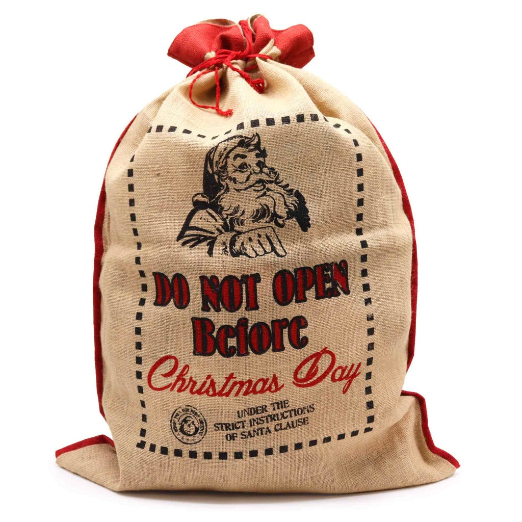 Reusable Christmas Present Bags - Santa Sacks - Natural Xmas Stockings. This wonderfully festive Jute Sack is strong and sturdy. Fill it with presents for your friends and family and also reuse it next year so you can get plenty of use out of it. Made in India. Available in four different designs. Colour Natural Black and Red. Size of the Jute Santa Bag: 76cm x 55cm Size: H: 76 cm; W: 55 cm. Material Jute