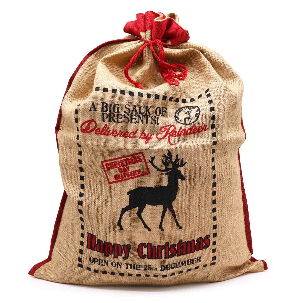 Reusable Christmas Present Bags - Santa Sacks - Natural Xmas Stockings. This wonderfully festive Jute Sack is strong and sturdy. Fill it with presents for your friends and family and also reuse it next year so you can get plenty of use out of it. Made in India. Available in four different designs. Colour Natural Black and Red. Size of the Jute Santa Bag: 76cm x 55cm Size: H: 76 cm; W: 55 cm. Material Jute