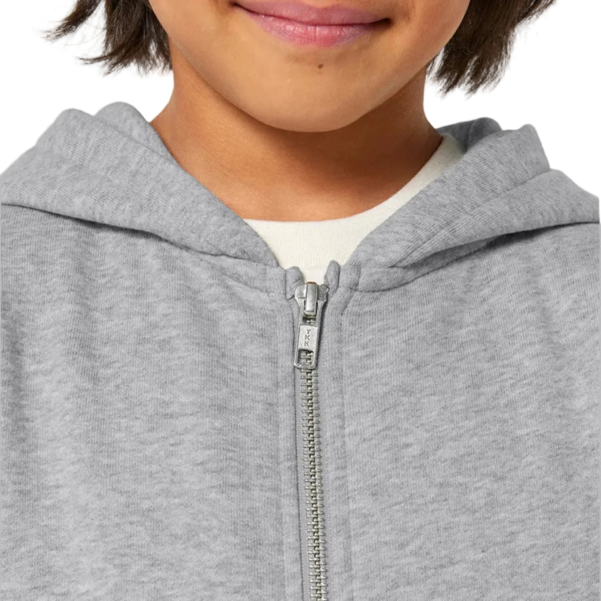 Close-up of a grey hoodie with a zipper on a plain background