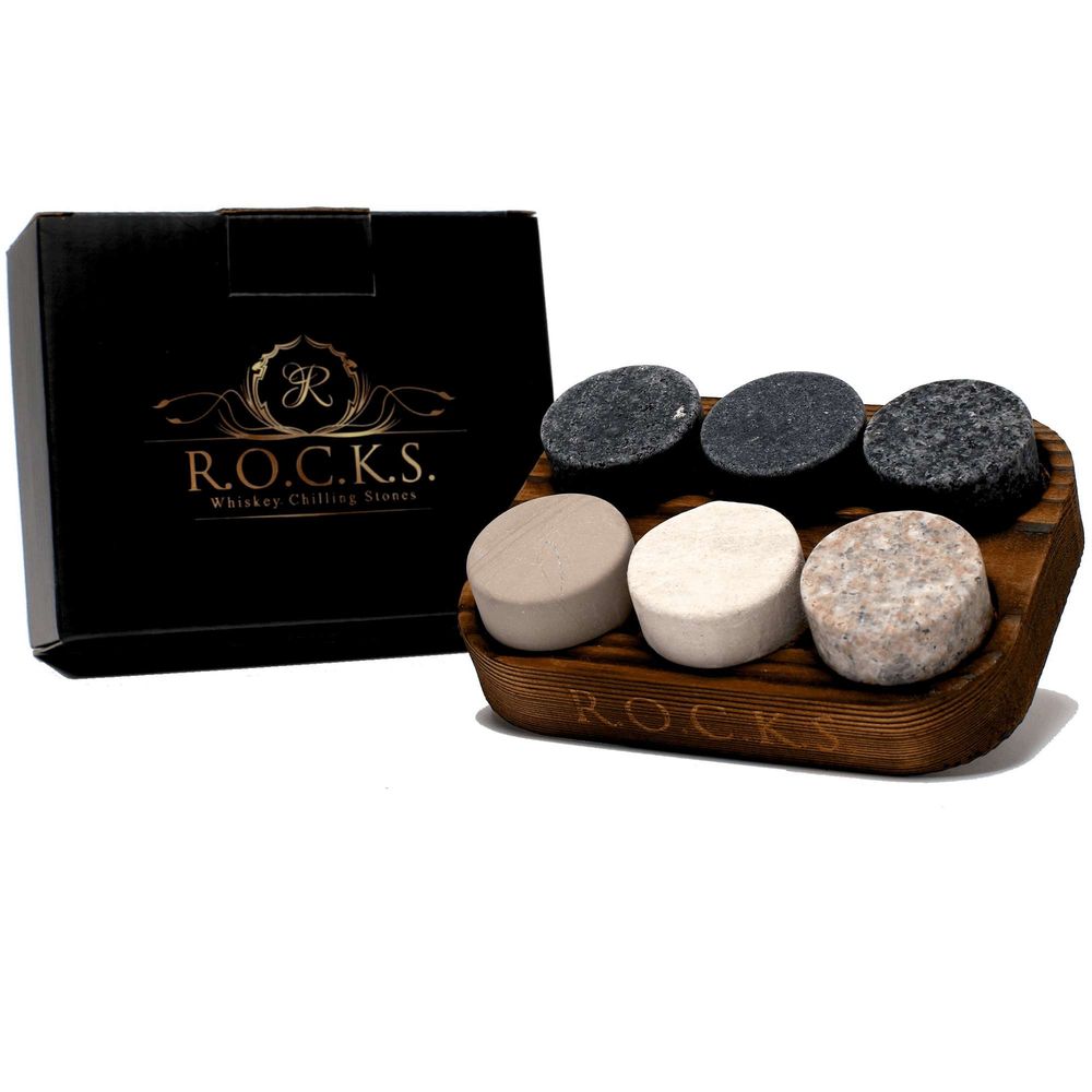 A set includes six whiskey stones, each featuring a unique colour and granite style.