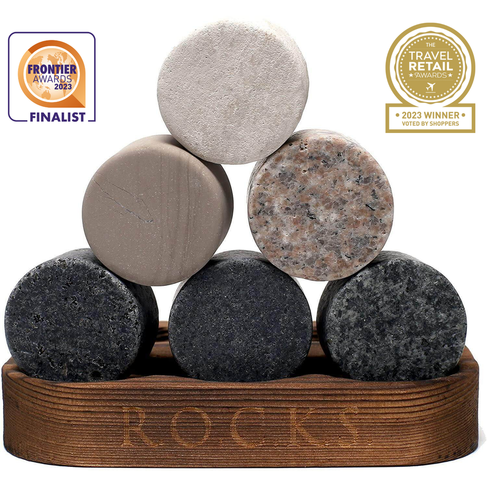 A set includes six whiskey stones, each featuring a unique colour and granite style.