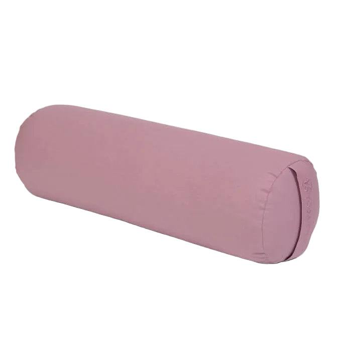 Pink cylindrical yoga roller on a light grey background