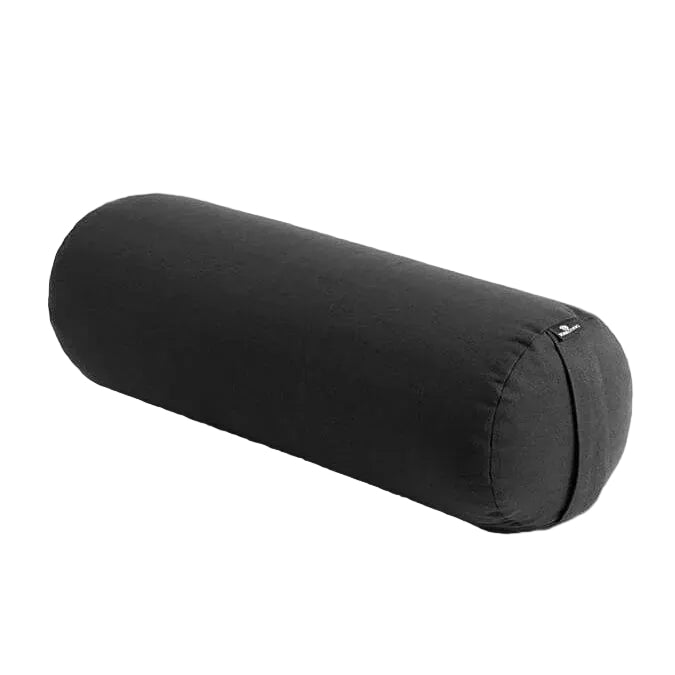 Black cylindrical yoga bolster on a light gray background