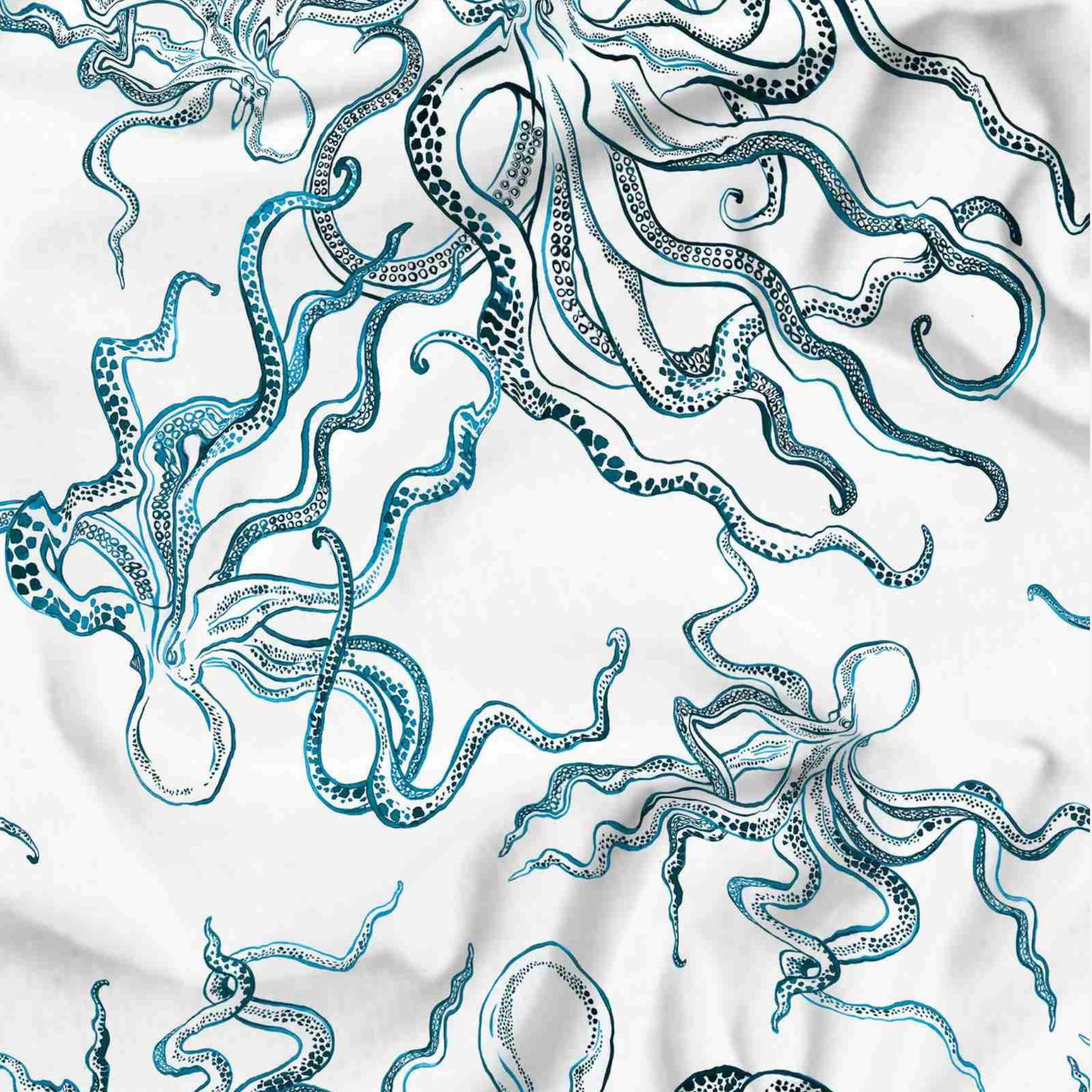 Pattern of blue and black octopus tentacles on a white background