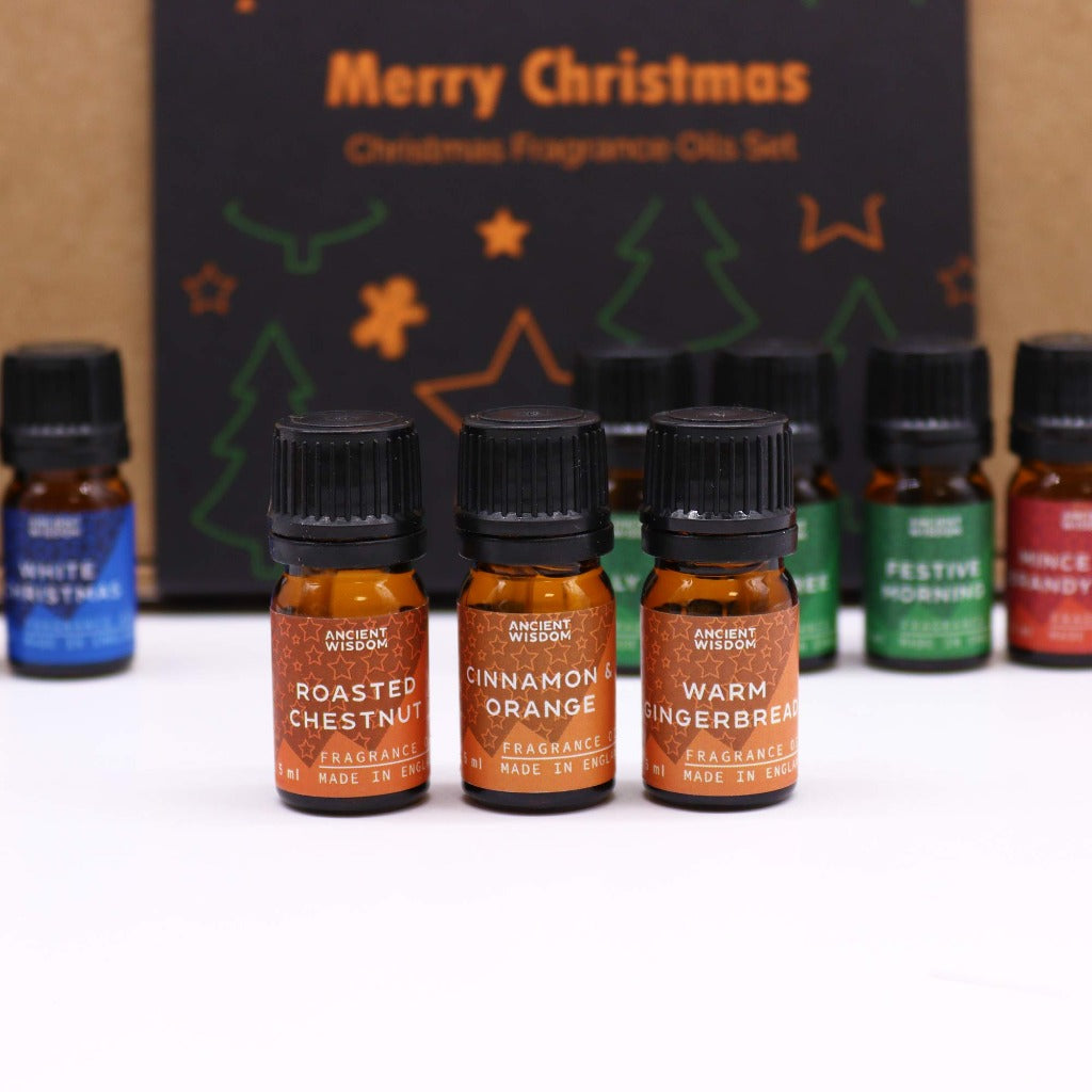 Christmas Fragrance Oils Sets - Christmas Home Fragrance Gift Set. Unleash the magic of the festive season with these Christmas Fragrance oil sets. Each set boasts a delightful collection of 12 fragrance oils, each vial holding 5ml of pure olfactory joy. The beautifully packaged sets make for an ideal gift choice, whether for loved ones or to entice your friends with the festive spirit.