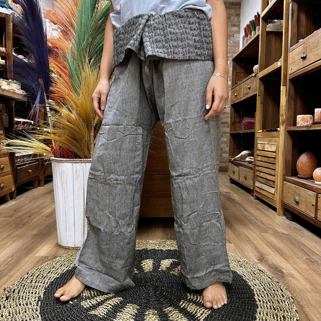 Cotton Yoga Trousers Comfy Festival Pants - Colourful Himalayan prints.a full range of Yoga and Festival Pants for you, all made from 100% cotton. These pants are made in Nepal and are super soft, lightweight, and stylish. They come in one size that fits everyone, making them a great choice for most people. Plus, we deliver these yoga and festival pants in a small cotton bag to add a special touch. The collection features three styles: High Cross, Aladdin, and Fisherman