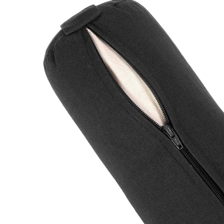 Close-up of a black cylindrical fabric item with a partially unzipped zipper revealing a light beige interior lining, set against a plain light background.
