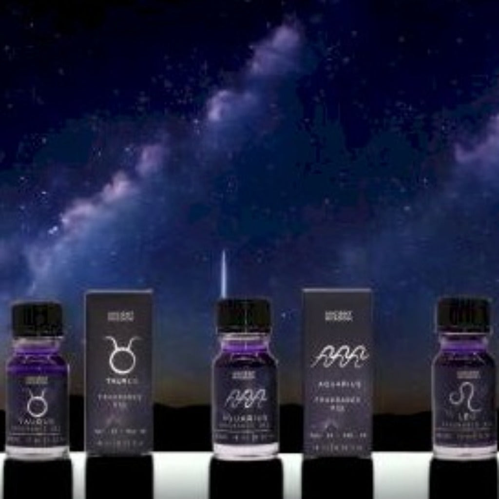 Emmy Jane - Ancient Wisdom - Zodiac Fragrance Oils with Bio Glitter and Gemstones Made in the UK. The Essence of The Stars. Welcome to a celestial journey where fragrance meets the cosmos. We are proud to present our exclusive collection of Zodiac Fragrance Oils, designed to connect your inner being with the celestial energy of your star sign. Each bottle is a crafted representation of the night sky, with dark hues and bio glitter mimicking the twinkling stars that guide our fate.