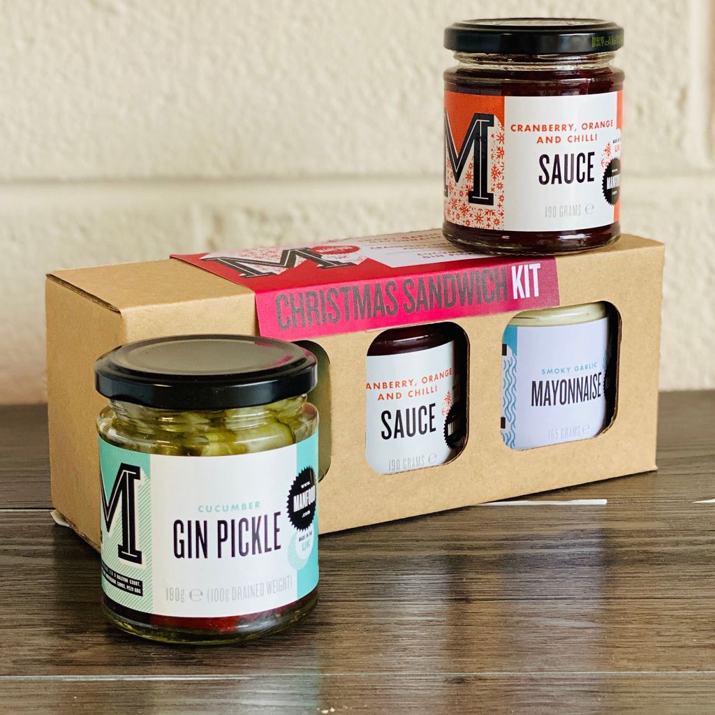 Emmy Jane Boutique Christmas Sandwich Kit. Whether you're vegan, vegetarian, or a complete carnivore, this kit contains three must-haves to enable you to make the ultimate Christmas sandwich from Boxing Day and beyond! Contains our Gin Pickle, Vegan Smoky Garlic mayonnaise, and Chilli cranberry sauce.