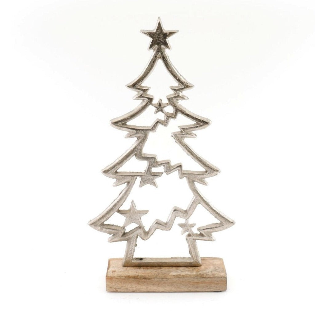 Emmy Jane Boutique - Christmas Decor Silver - Metal Christmas Tree & Stars On Wooden Base. A contemporary design of a silver Christmas tree shape, fixed upon a wooden plinth. A striking decoration to enhance your Christmas displays.  Silver Christmas tree Material wood and metal Colour Silver Measurements: Depth 4.8 cm x Height 31 x Width 18cm Weight 1 kg.