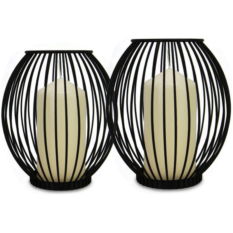 Emmy Jane Cage Candle Holder - Set of 2 Black Metal Pillar Candle Holders - Maison & White Two candle holders that are of different sizes, the candles that will fit are traditional pillar candles that are no more than 17cm tall for the larger candle holder and 15cm tall for the smaller holder