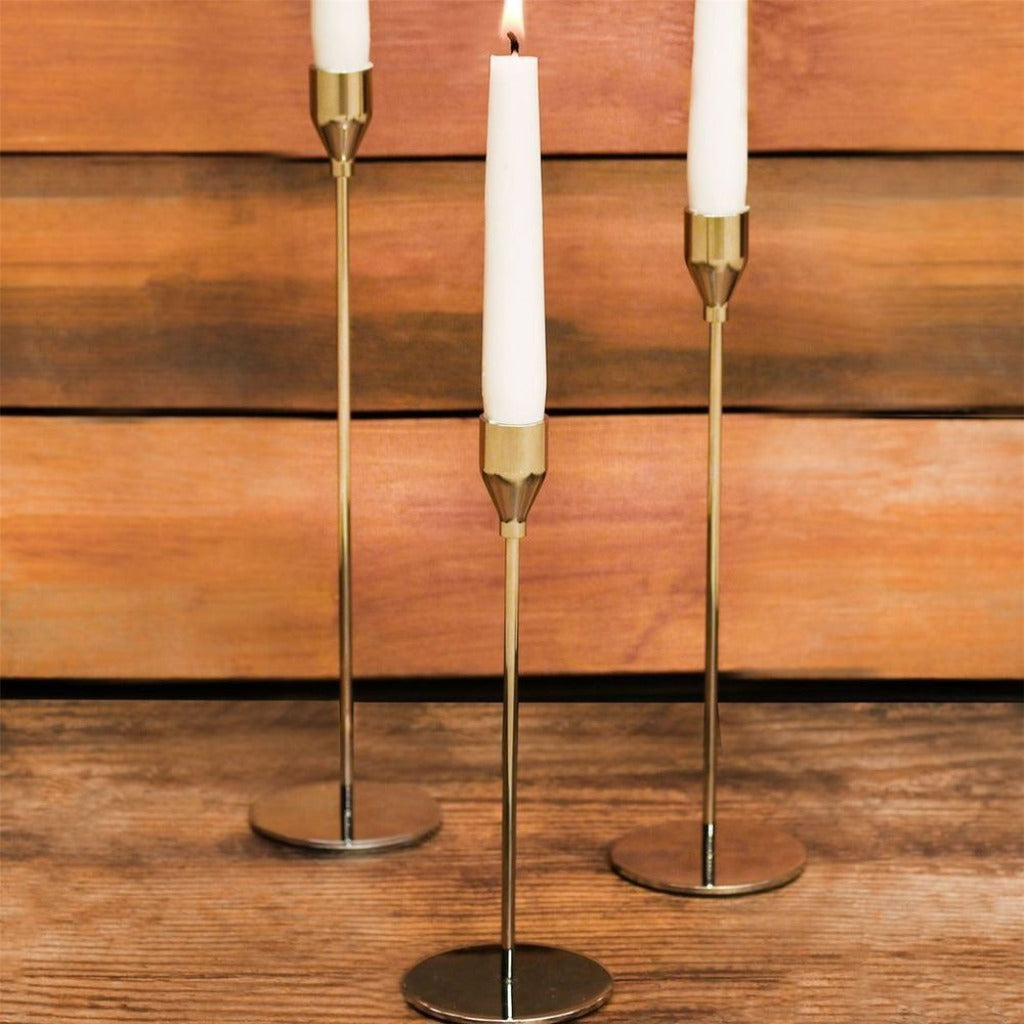 Emmy Jane Boutique Tulip Candlesticks - Set of 3 Gold  - Maison & White. The tall candle holders come as a set of 3, with each of them being a different size. Their simple, yet elegant design will definitely add that extra touch to your dinner table.